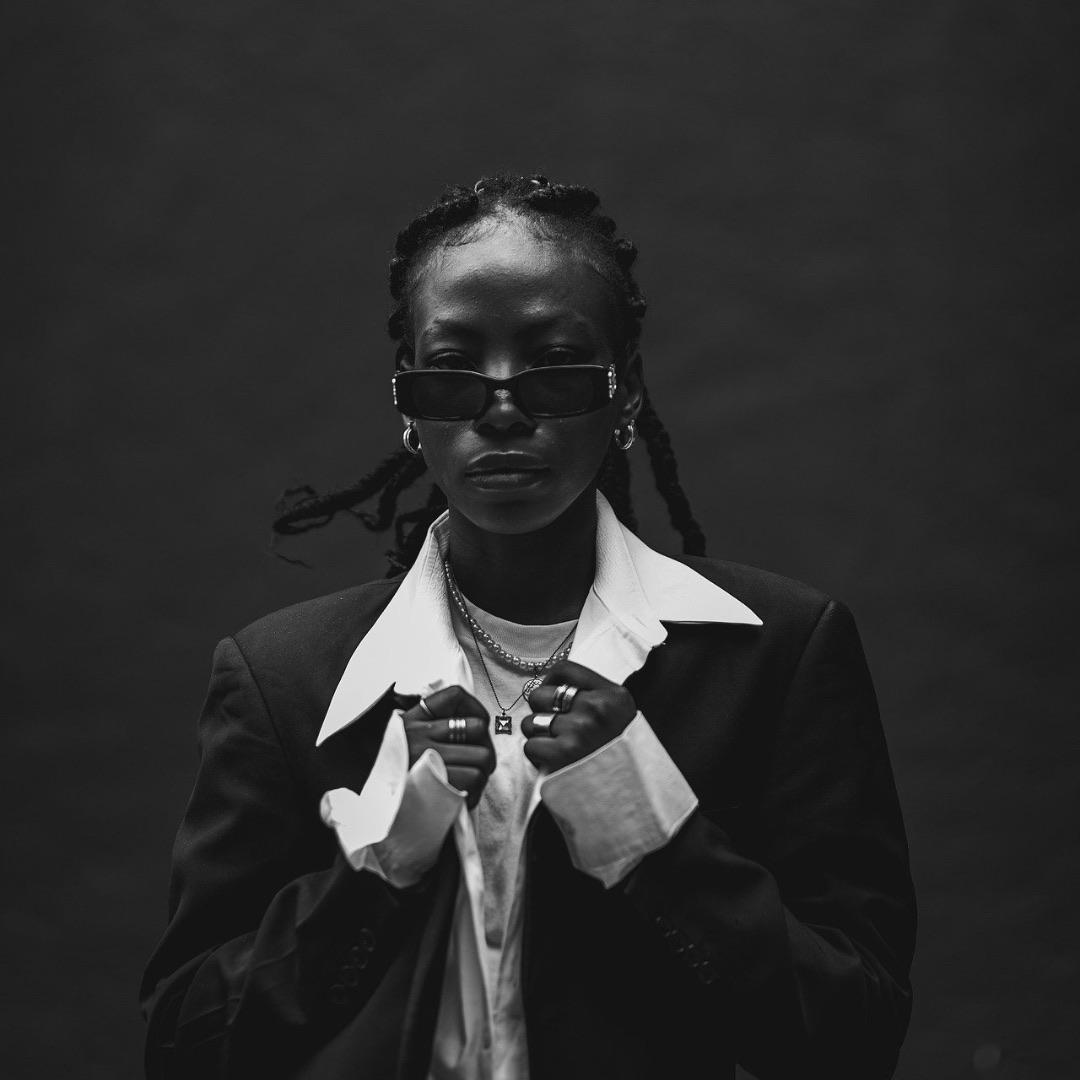Black-and-white Maurizio Giacomoo fashion portrait featuring statement eyewear